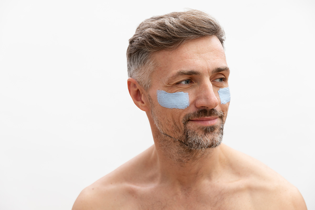 man-using-anti-aging-treatment