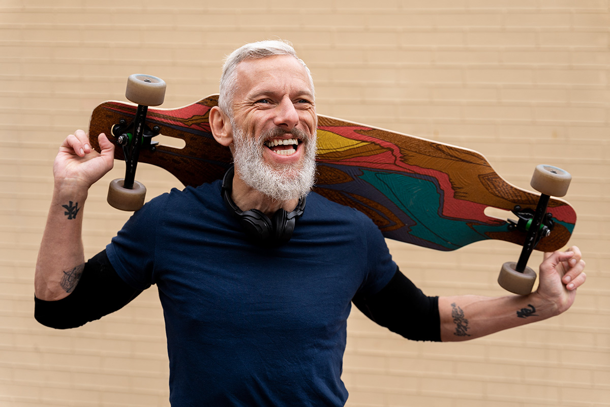 mature-man-with-sustainable-mobility-skateboard