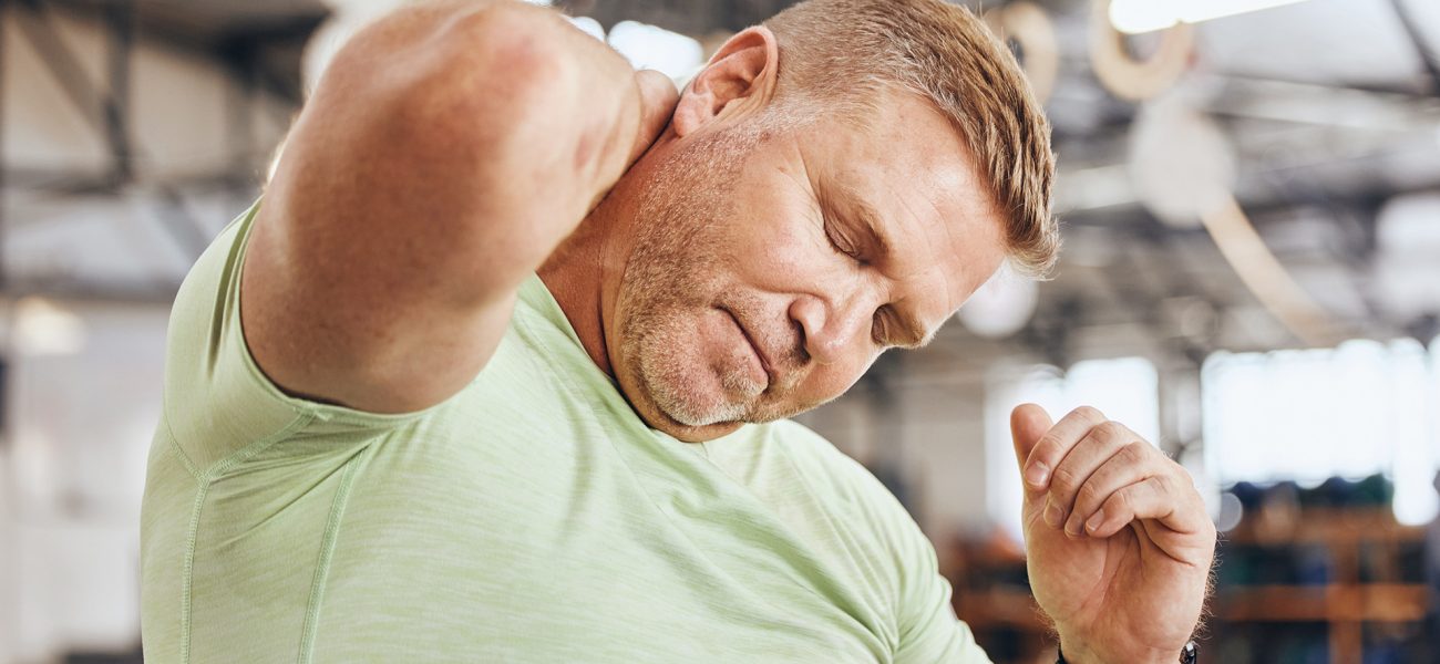 accident-fitness-man-with-neck-pain-from-training-gym-stress-burnout-from-body-building-tired-mistake-bodybuilder-with-spine-muscle-injury-after-exercise-workout-cardio